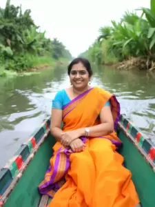 A woman in a bright sari or dress, sitting in a colorful shikara, smiling peacefully as the boat glides past lush green banks.