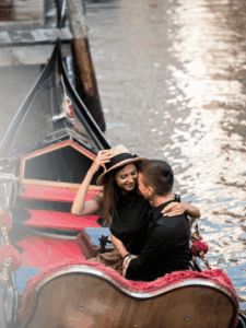 Sliding into Serenity — Shikara Rides in Kerala Vast, wide, serene, inviting you for a lazy ride over the rippling waters — Kerala’s backwaters are iconic. So are the houseboats, travelers use to cruise these expansive waterways, but for those who are unaware, there's another way to experience the magic — one that’s quieter, closer, and more personal: the shikara ride. What is a Shikara? The word "shikara" comes from the Sanskrit language, where śikhara means "peak" or "summit." Over time, the term came to denote various pointed or elevated structures, like the spire of a temple. In the context of boats, the term evolved to describe the traditional Kashmiri wooden boat with a high, pointed prow and canopy. It has a narrow and elongated shape with a covered top to shield passengers from the sun. The roof is woven with coir or bamboo for a rustic look. Inside, cushioned seats line the sides, offering a cozy and intimate space to relax as you glide past Kerala’s lush, water-laced landscapes. Unlike the bigger, engine-powered houseboats, the shape of the shikara allows it to be rowed. It can also be equipped with small motors, making the journey much quieter. This silence lets you hear the soft splash of oars, birdsong, and village sounds drifting from the shore. A ride on a shikara is an immersive experience in nature. Shikara vs Houseboat: Which One Should You Choose? Houseboats are great for overnight stays and large groups, but they can feel bulky and a bit detached from the surroundings. A shikara, on the other hand, is nimble. It weaves through narrow canals and smaller waterways that houseboats can’t reach. This means closer views of daily life — kids waving from doorsteps, women washing clothes by the banks, fishermen casting nets into the water. If you choose the Shikara vs Houseboat Kerala experience, the atmosphere will be more peaceful, more engaging, and enveloping. A Shikara Boat Ride in Kerala is not just a ride; it is a window into Kerala’s soul. For couples, photographers, or anyone craving quiet and beauty, a Kerala Backwater Shikara Tour is a better choice. It is always recommended that you opt for a Traditional Shikara Experience to see a different side of the Kerala countryside. Top destinations for budget-friendly backwater rides in a Shikara Two of the best places for cultural boat rides in Kerala are Alleppey (Alappuzha) and Kumarakom. The Alleppey Shikara Ride winds through narrow canals flanked by coconut palms and rice fields. You’ll see peaceful villages, traditional homes, and occasionally, even an old temple standing silently on a bank. On the other side of Lake Vembanad lies Kumarakom, which offers a slightly different vibe — more serene and secluded. The waters here are dotted with birdlife, especially around the Kumarakom Bird Sanctuary. It’s a favorite for nature lovers and anyone wanting to escape the crowds, and is therefore, a highlight of a Backwater Cruise Kerala. You can also opt for traditional boat rides through Kerala’s canals. Budget-Friendly Backwater Rides — Duration and Pricing Shikara rides in Kerala are typically priced by the hour, making them more budget-friendly when compared to houseboats. On average, you will be required to pay ₹500 to ₹800 per hour, depending on the season and the boat’s size or features. Rides can last from one hour up to half a day, allowing you to tailor the ride according to your plans and pace. Tips to Make the Most of the Best Shikara Rides Timing is everything: The Best Time for Shikara Rides in Kerala is sunrise or sunset. Go early in the morning (around 6:30–8:00 AM) for a misty, golden experience — or opt for a sunset ride when the skies turn fiery and reflections shimmer across the water. Enjoy your Alleppey Shikara Ride before heading on to Kumarakom. Best for small groups: Shikaras seat around 2 to 6 people, making them ideal for couples, families, or solo travelers looking for some quiet. On special request, romantic Shikara boat rides for couples can also be arranged. What to bring: Carry drinking water, a camera for the scenery and candid moments, and a hat or sunglasses to protect yourself from the tropical sun. What to Expect during a Traditional Shikara Experience One of the rewards of a shikara ride itinerary in Alleppey or Kumarakom is the chance to observe life in its natural cycle. As you glide past villages, you’ll see men climbing coconut trees for Todi collection, which is the local liquor, women walking to temples in traditional saris with flowers tucked into their naturally long and black hair, and witness the rhythmic pulse of rural life that hasn’t changed much in decades. You’ll pass coconut groves, small and colorful temples, and sometimes floating vegetable vendors. A Traditional Shikara Experience opens up Kerala to you, in its most authentic and unfiltered form — an experience you’ll cherish for a lifetime. If you’re headed to Kerala and want to experience the backwaters in a more soulful, intimate way, skip the noise and book a shikara. It’s not just transportation—it’s time travel on water, and beauty beyond words.